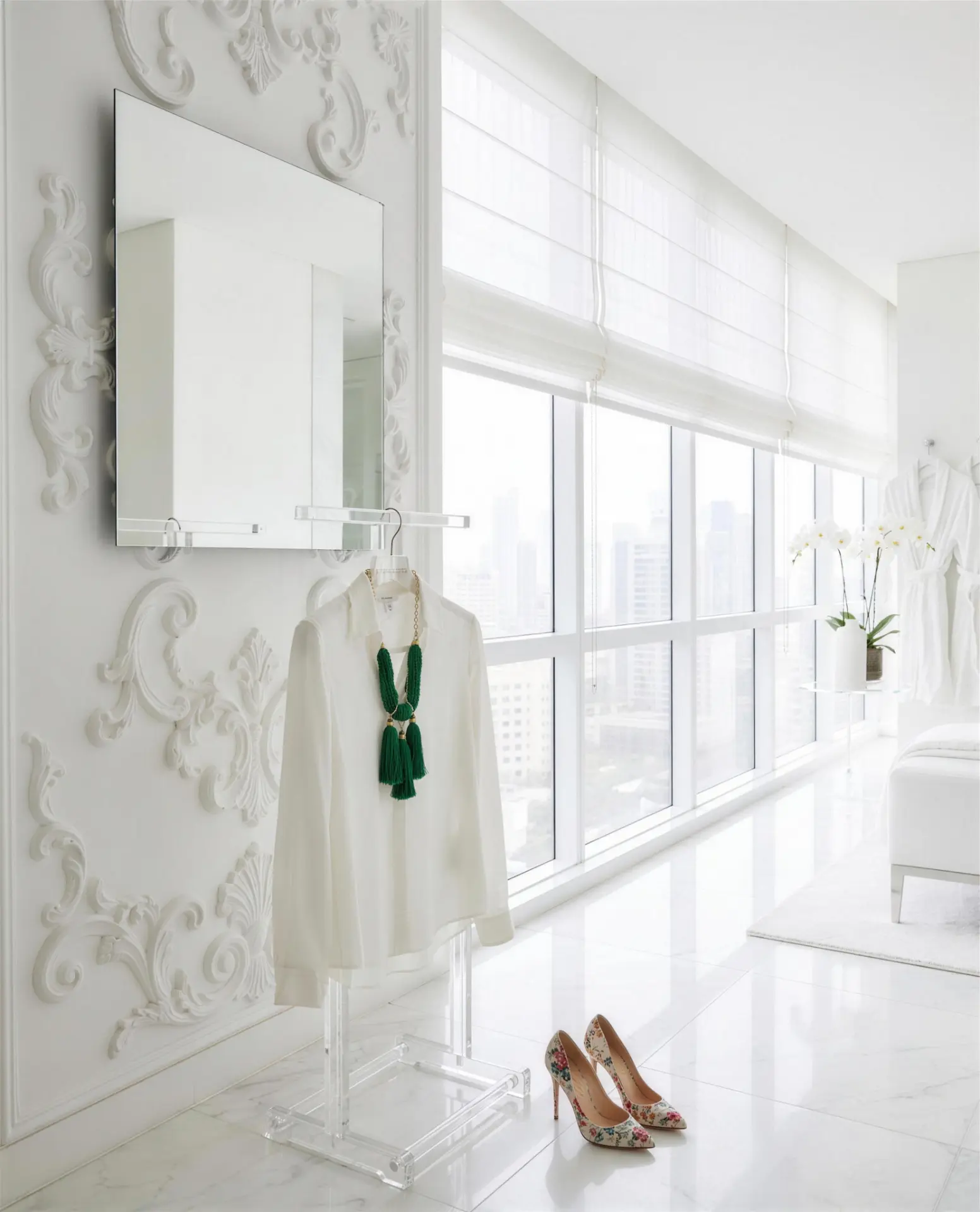 White dressing area with sculpted plaster wall